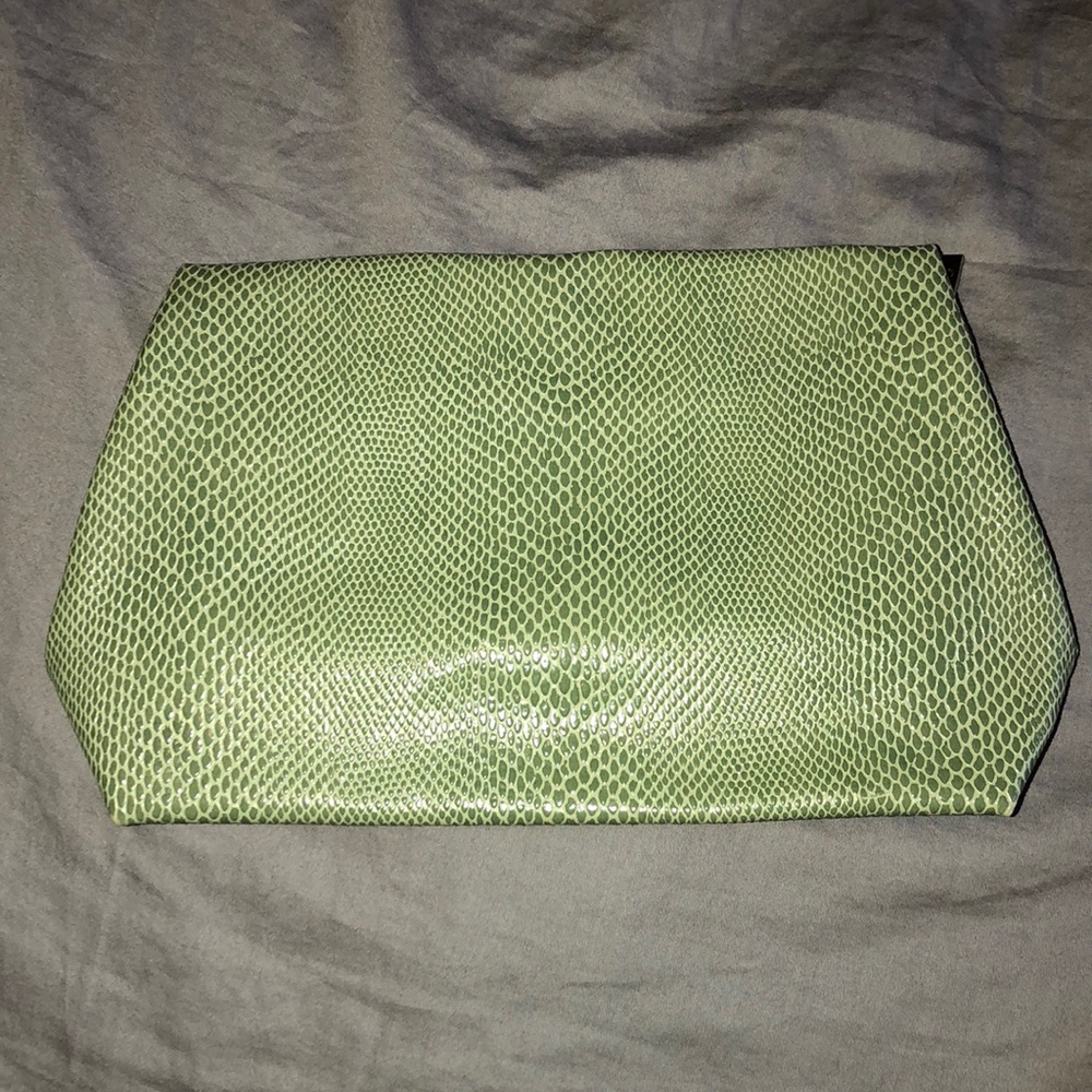 Green cosmetic bag.